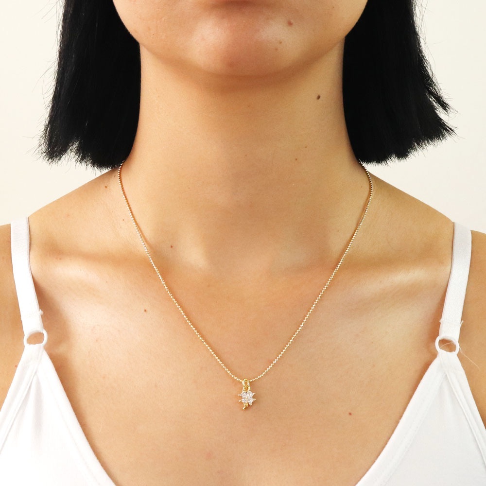 Elegant Gold Necklace with Star Pendant
